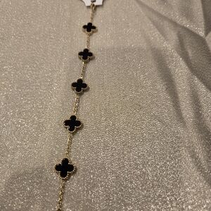 Elegant Black and Gold Clover Necklace